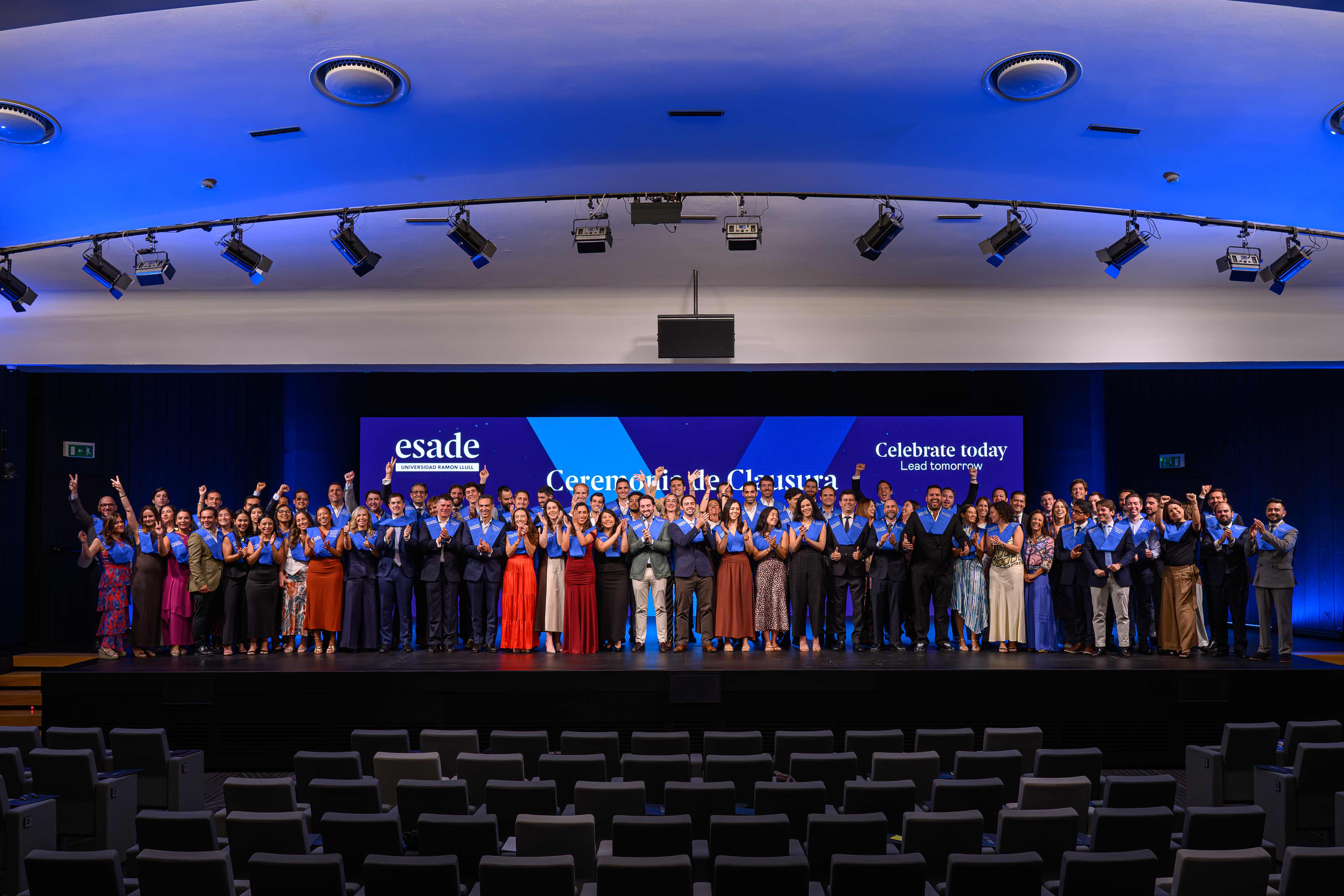 The 2026 ESADE Executive Masters Madrid graduating class celebrating on stage.