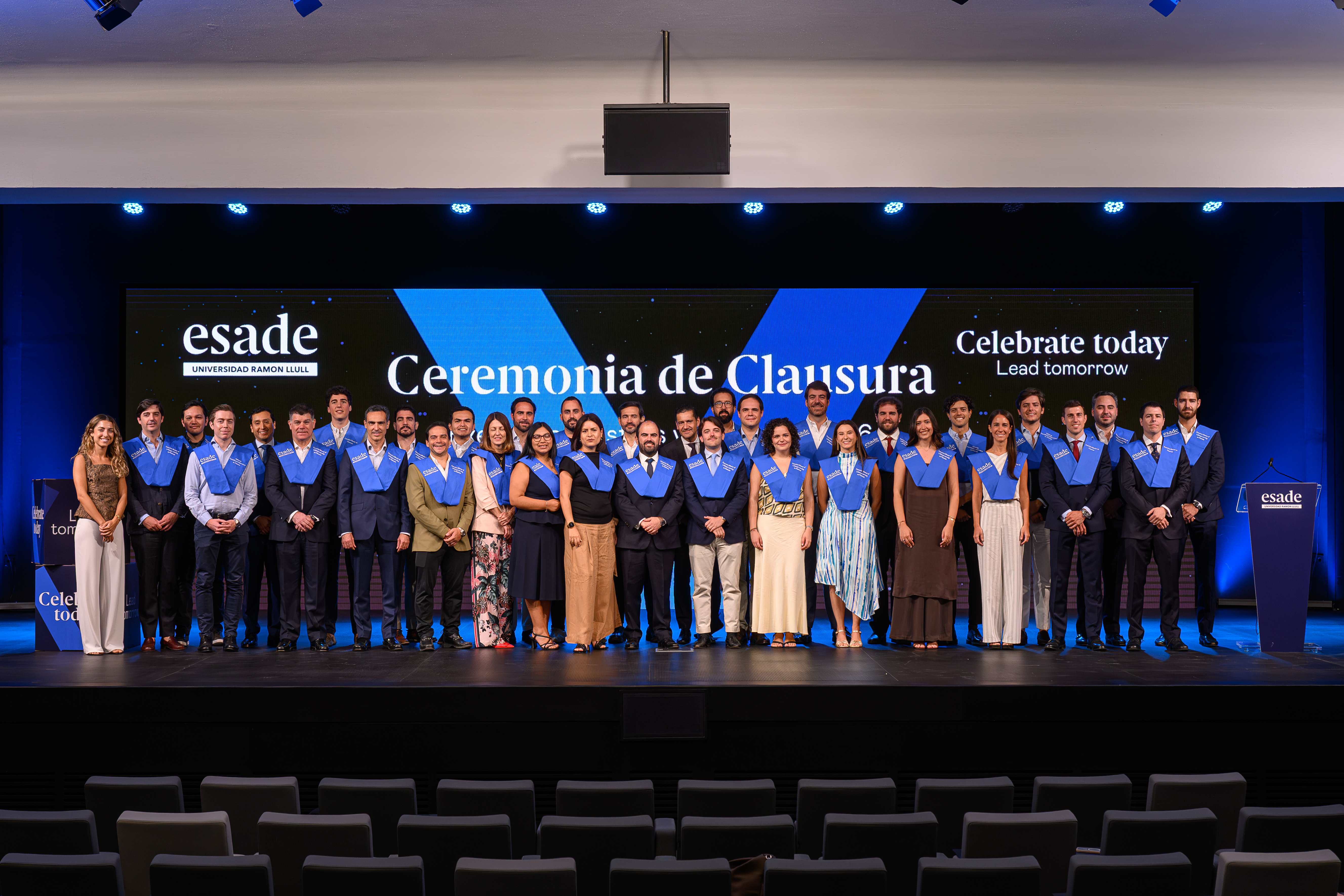 Graduates of the 2026 ESADE Executive Masters in Finance class gathered on stage at the Closing Ceremony.