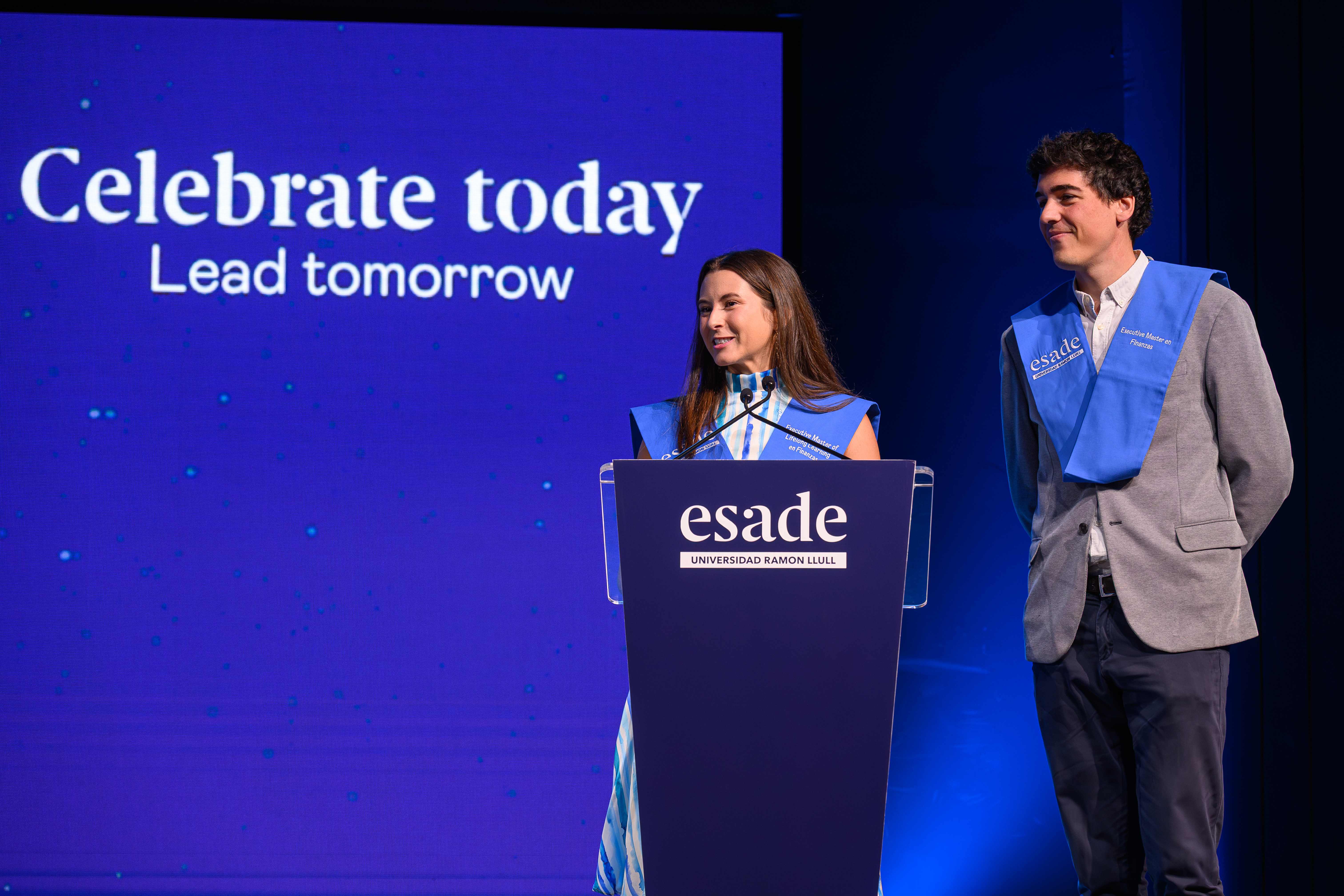 Two of the four Executive Masters in Finance class representatives (Amelia Tejada and Xavier Montané) speaking at the ESADE Closing Ceremony in Madrid.