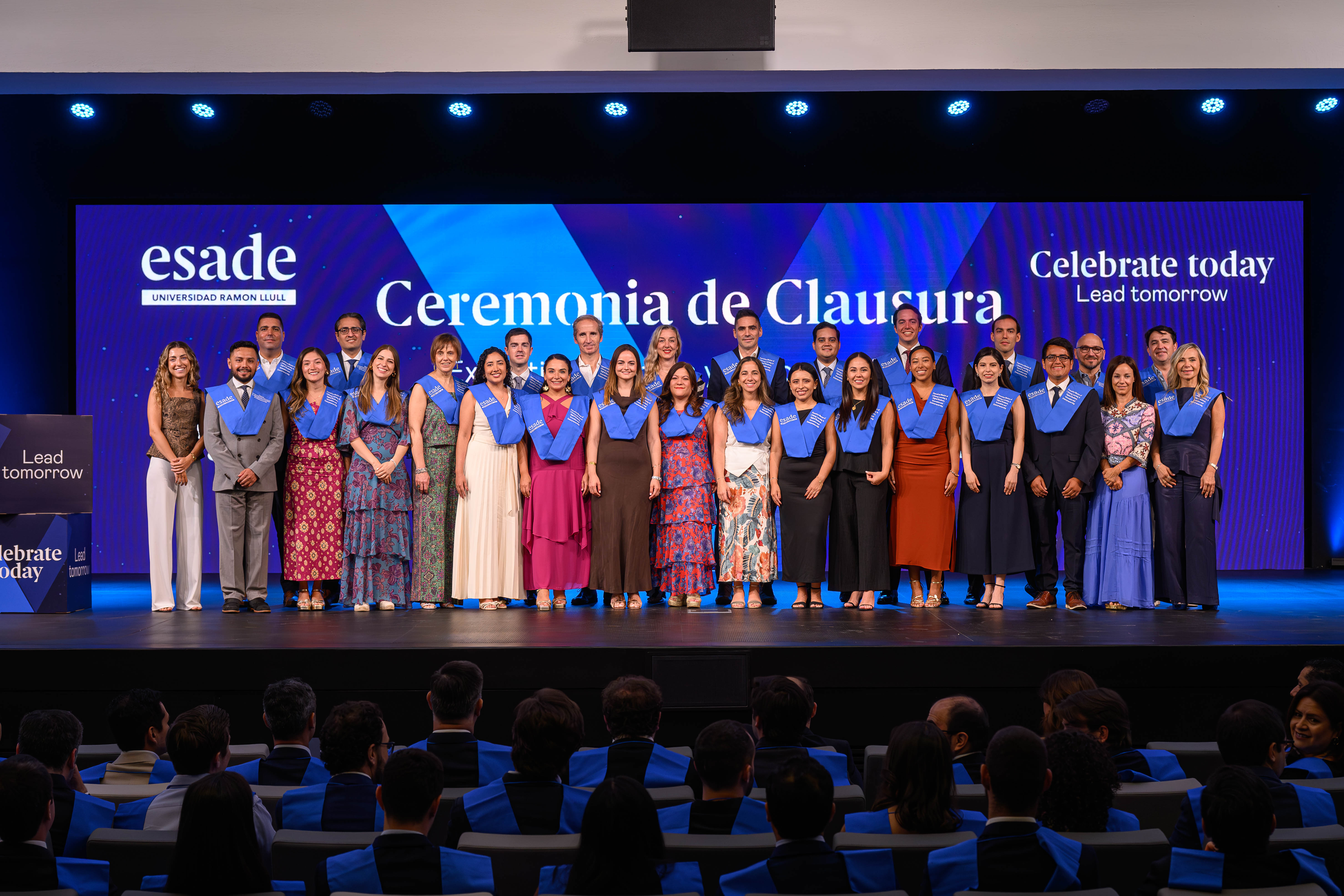 Graduates of the 2026 ESADE Executive Masters in Digital Business, Innovation & Entrepreneurship class gathered on stage at the Closing Ceremony.